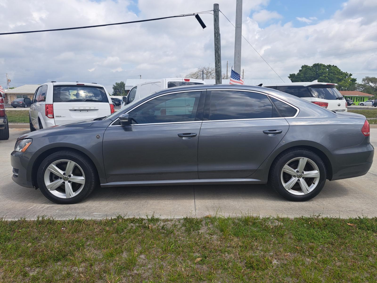 2014 Black Volkswagen Passat 1.8T S AT (1VWAS7A31EC) with an 1.8L L4 TURBO DIESEL engine, 6-Speed Automatic transmission, located at 1181 Aurora Rd, Melbourne, FL, 32935, (321) 241-1100, 28.132914, -80.639175 - Photo #0
